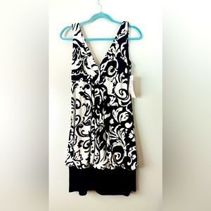 Black and white sleeveless mini dress with black back drape  size 10